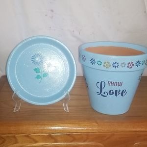 These are handpainted clay and terracotta pots